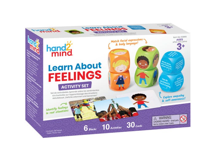 Purple and white toy box with 6 colorful cubes showing facial expressions and 30 illustrated activity cards.