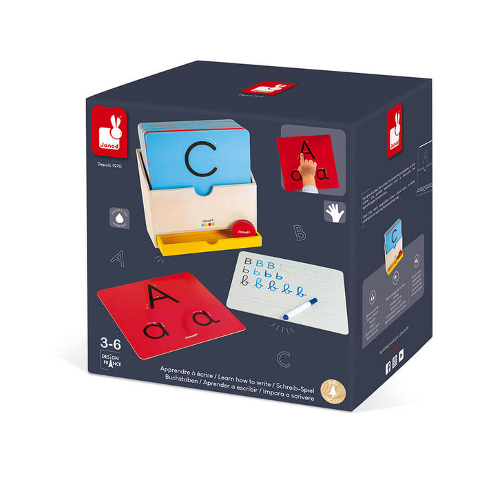 Janod box set with red and blue letter tracing cards, a wooden card holder, and a dry-erase board with a marker.