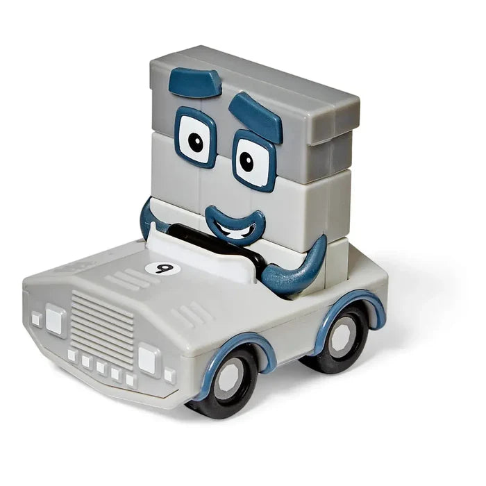 Grey Numberblock Nine figure with blue glasses in a grey toy car with blue accents and the number 9 on the hood.