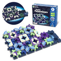 Colorful interlocking gears with patterned stickers on dark bases, shown with product box and glow-in-the-dark inset.