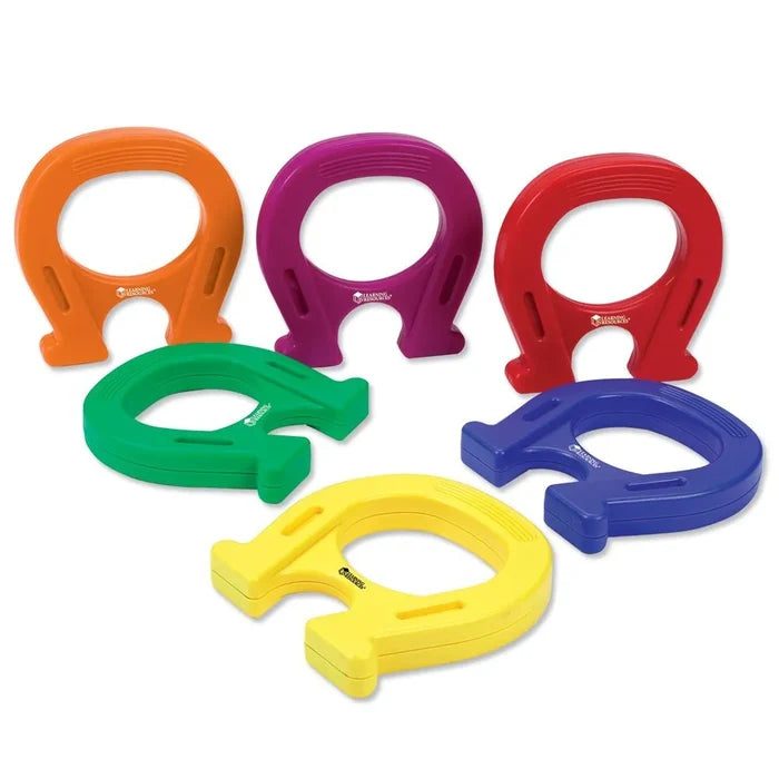 Six chunky horseshoe magnets in orange, purple, red, green, blue, and yellow with large easy-grip handles.