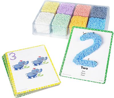 Eight colorful textured foam blocks in a tray with number learning cards and animal illustrations.