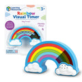 Rainbow-shaped visual timer with colorful bands and white cloud bases, shown in and out of its retail packaging.