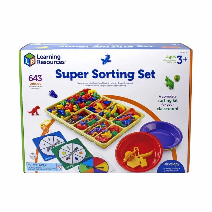 Box of sorting toys with a yellow tray of colorful plastic animals, fruits, bowls, and game spinners.