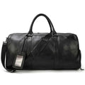 Black leather business travel bag by Mead's Supply & Equipment Outfitters, featuring multiple compartments and bronze accents.