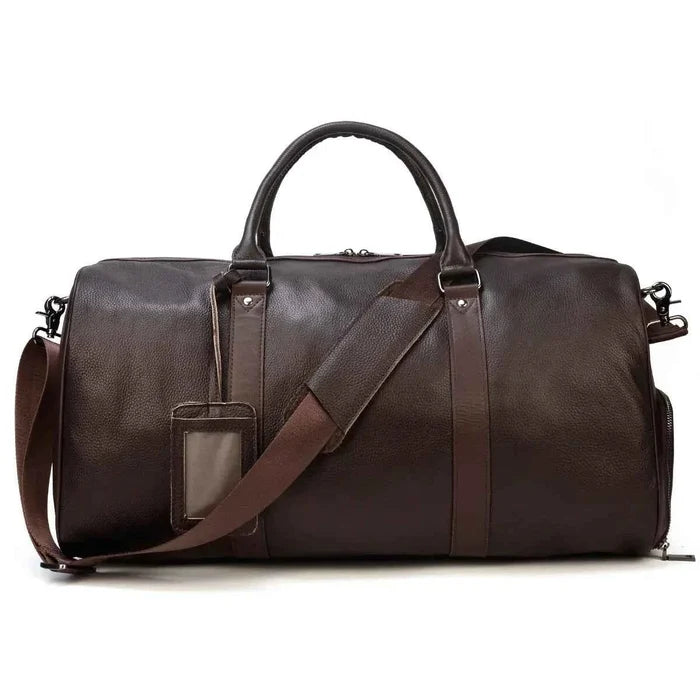 Leather business travel bag by Mead's Supply & Equipment Outfitters, black and bronze duffel with multiple compartments, stylish and durable.