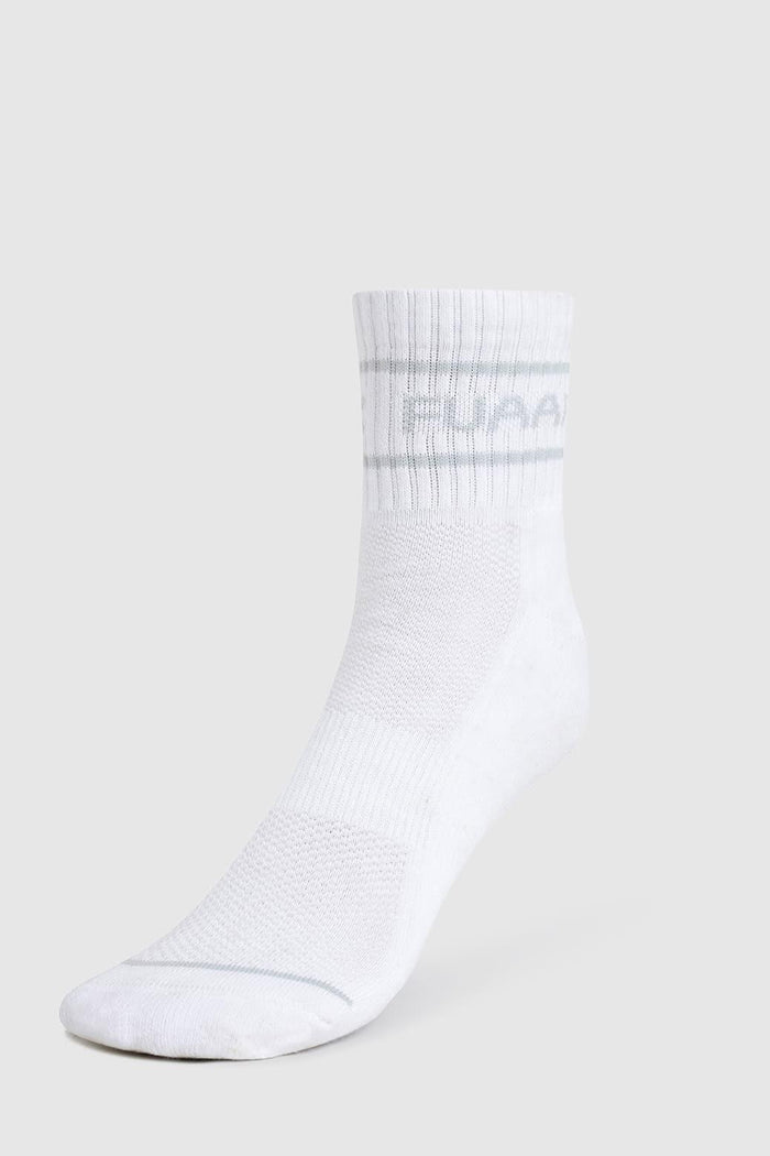 White and grey Fuaark NZ Legacy Quarter Socks displayed flat, showing the comfortable sock design and branding details.