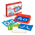Orange sensory pad with blue gel, a stylus, and letter cards next to its white and red retail packaging.