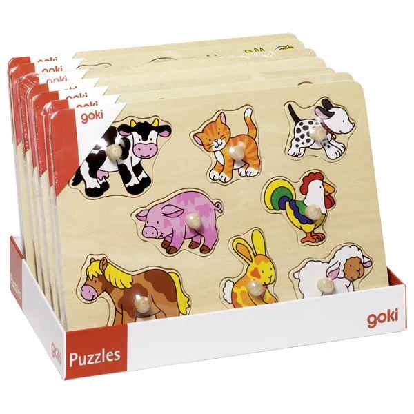 Wooden peg puzzles with farm animal pieces including a cow, cat, dog, pig, and horse, stacked in a display box.