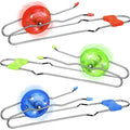 Red, green, and blue light-up magnetic wheel toys spinning on long metal tracks with matching handles.