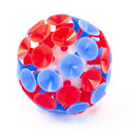 Round ball covered in red and blue suction cups extending from a white center.