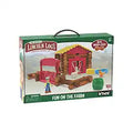Green box showing a farm scene with a red log barn, yellow roof, farmer figure, goat, and chicken figures.