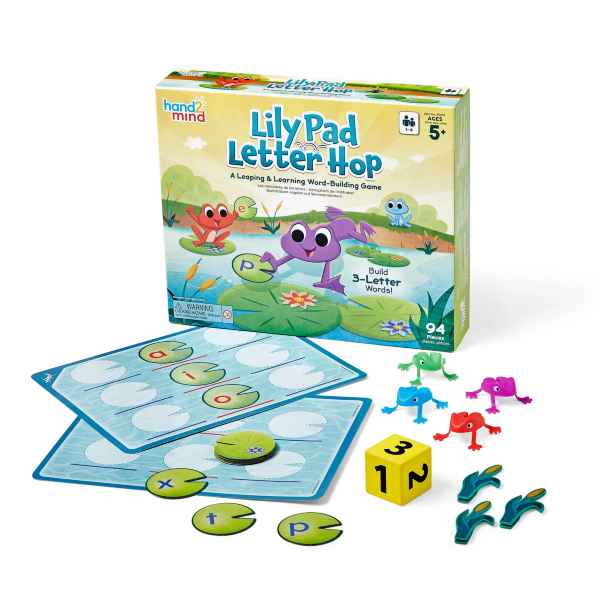 Lily Pad Letter Hop game box, colorful frog figures, blue mats, green letter discs, and a yellow numbered die.