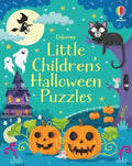 Teal book cover with two large pumpkins, a purple haunted house, ghosts, and a black cat on a tree branch.