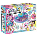 Pink Lockitz Luxury Studio kit box featuring a heart-shaped jewelry station, colorful beads, and custom charm lockets.