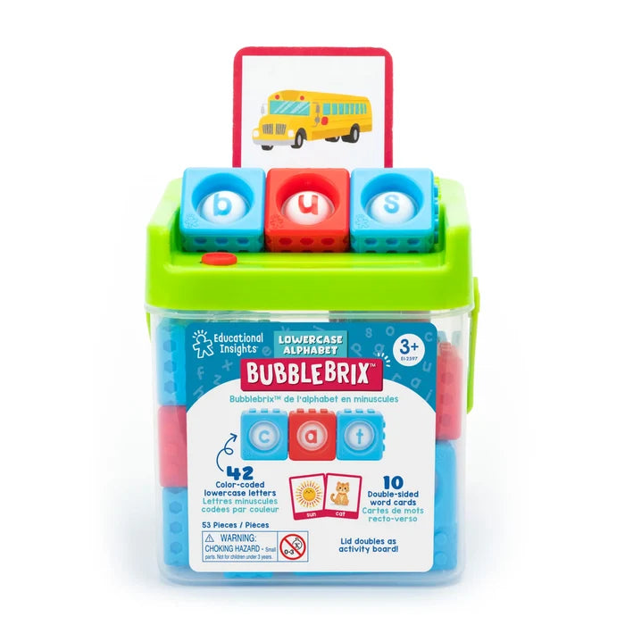 Red and blue blocks with letters in bubbles inside a clear bin with a green lid and a bus picture card.