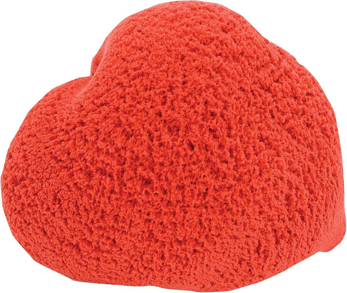 Heart-shaped mound of bright red molding compound with a porous, sandy texture.