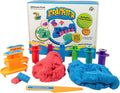 Red and blue sensory dough with colorful extruder molds, orange brick maker, and plastic tools in front of the box.