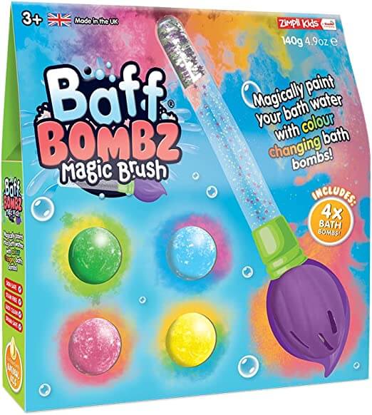 Box for a bath toy set featuring a purple glittery brush and four round bath bombs in green, blue, pink, and yellow.