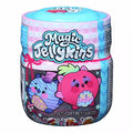 Cylindrical blue and pink toy jar with illustrations of round purple and pink characters on a checkered label.