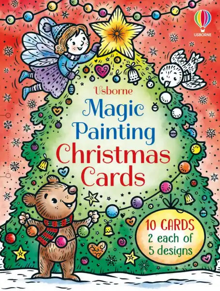 Colorful card pack cover with a fairy, bear, and bird decorating a Christmas tree against a red snowflake background.