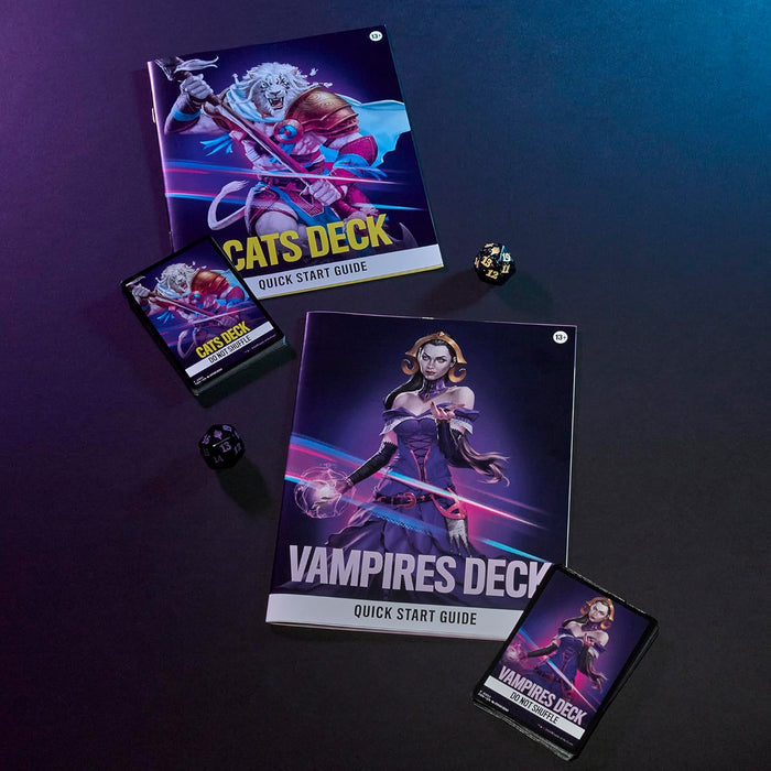 Two card decks and guides for Cats and Vampires with two black 20-sided dice on a dark, neon-lit surface.