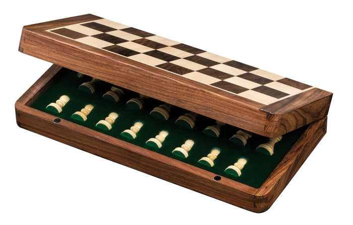 Partially open wooden chess case with a checkered top and white pieces nestled in green felt-lined slots.