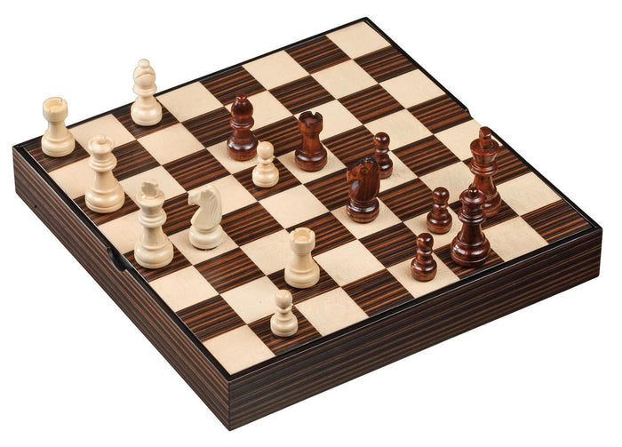 Light and dark brown wooden chess pieces on a matching checkered board with a thick, striped wood grain base.