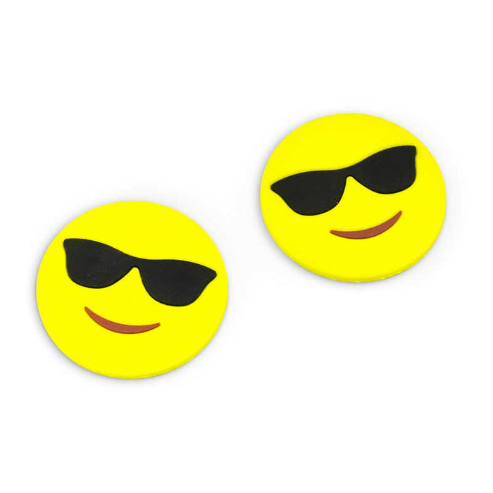 Two round yellow magnetic finger sliders with black sunglasses and brown smiles, resembling the cool emoji face.