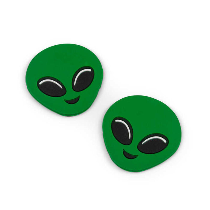 Two green alien head shaped sliders with large black eyes and a small smiling mouth.