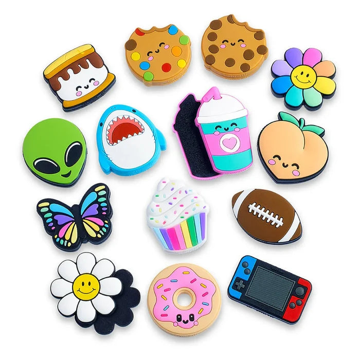 Thirteen colorful cartoon-style magnetic sliders shaped like a donut, shark, alien, cupcake, and a football.