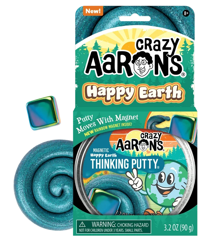 Teal magnetic putty swirl, metal tin, and iridescent square magnet in front of green cartoon Earth packaging.