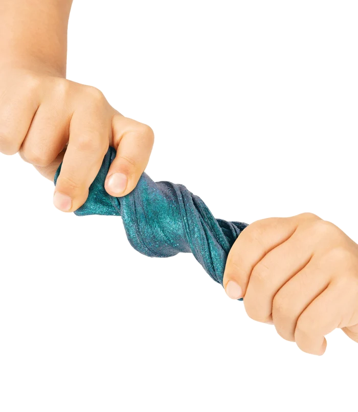 Two hands twisting a shimmering, dark teal and blue glitter putty against a white background.
