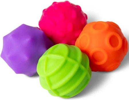Purple, pink, lime green, and orange sensory spheres with unique textures like spikes, bumps, grooves, and indents.