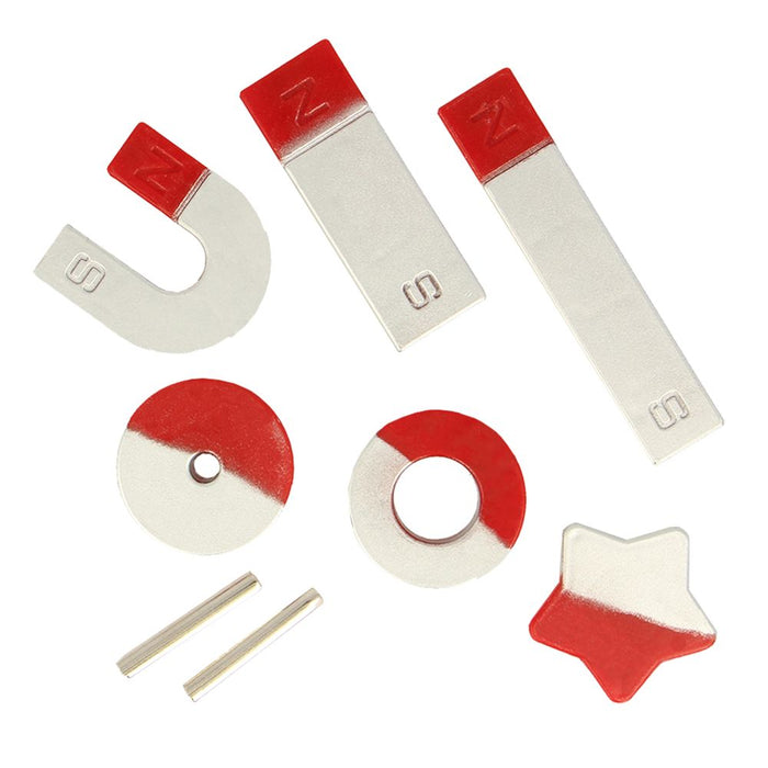 Collection of red and silver magnets in horseshoe, bar, ring, star, and disc shapes with N and S markings.