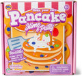Pink box for a pancake slime kit featuring a cartoon stack of pancakes with colorful slime syrup and a toy flipper.