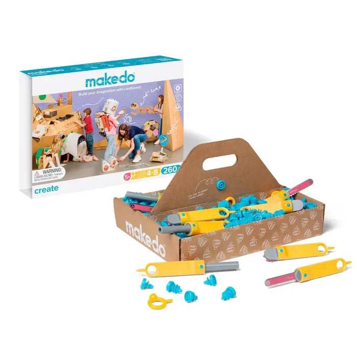 Makedo Create 260 box and tray with blue screws and yellow cardboard-cutting tools on a white background.