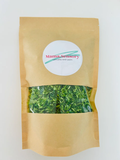 Brown kraft pouch with a clear window showing bright green rice and a white Mama Sensory logo sticker.