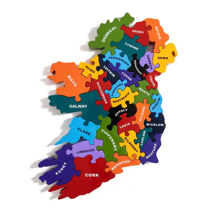 Colorful jigsaw puzzle of Ireland with interlocking pieces shaped like counties and labeled with white text.