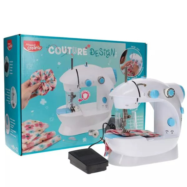 White and light blue toy sewing machine with black foot pedal and fabric, next to its teal illustrated box.
