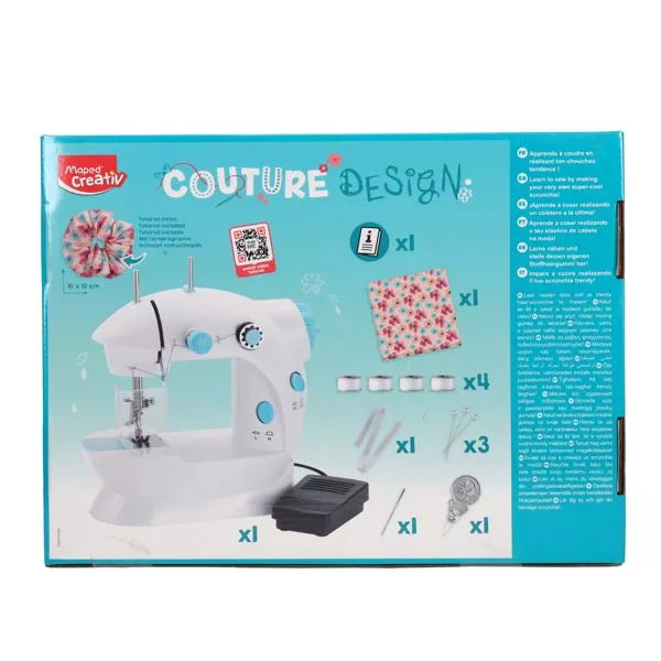 Blue box showing a white toy sewing machine, black foot pedal, floral fabric square, thread bobbins, and needles.
