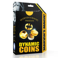Black and yellow magic trick box featuring images of gold metal caps and a stack of silver coins.