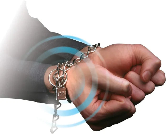 A silver chain and padlock secured around a person's wrist with glowing blue magic ripple effects.