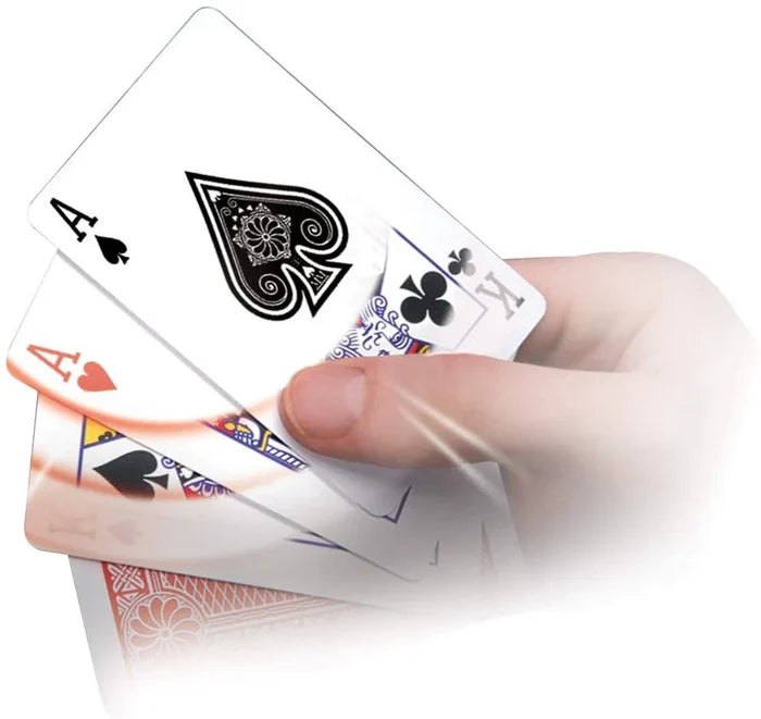 Hand holding fanned playing cards featuring the Ace of Spades with white glowing light streaks.