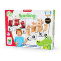 White game box showing bus and cake word puzzles, a smiling boy, and a green cartoon crocodile.