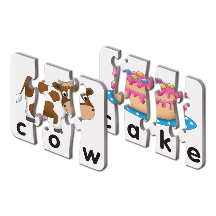 Interlocking puzzle tiles spell C-O-W and C-A-K-E with matching cartoon illustrations of a cow and a pink cake.