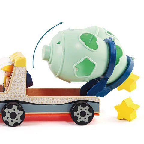 Wooden toy truck with a tilting light green shape sorter drum and yellow star-shaped pieces.