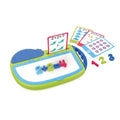 Magnetic math board with colorful plastic numbers, symbols, and illustrated addition and subtraction flashcards.
