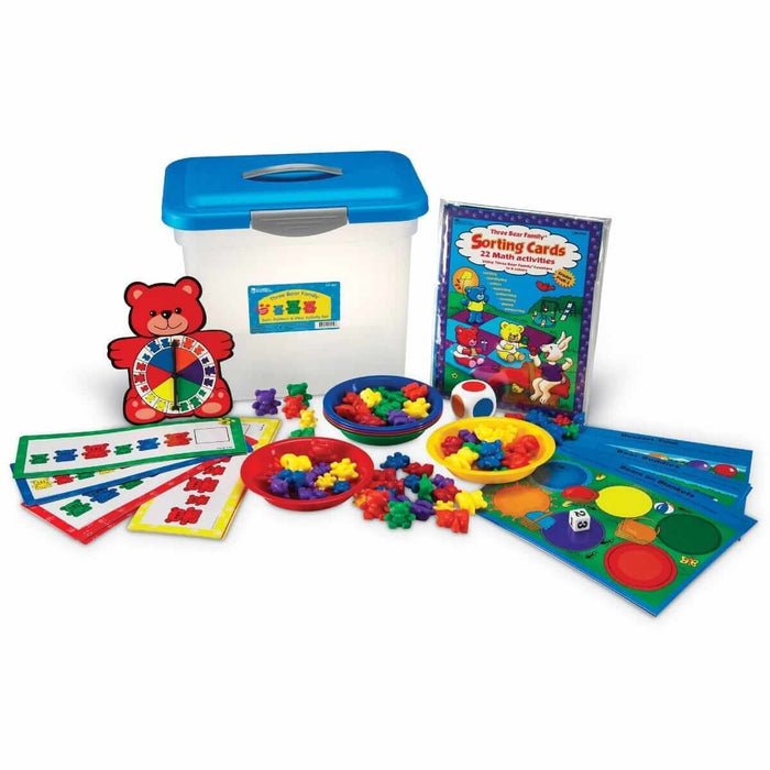 Multicolored bear counters, sorting bowls, activity mats, and a bear spinner with a clear plastic storage tub.