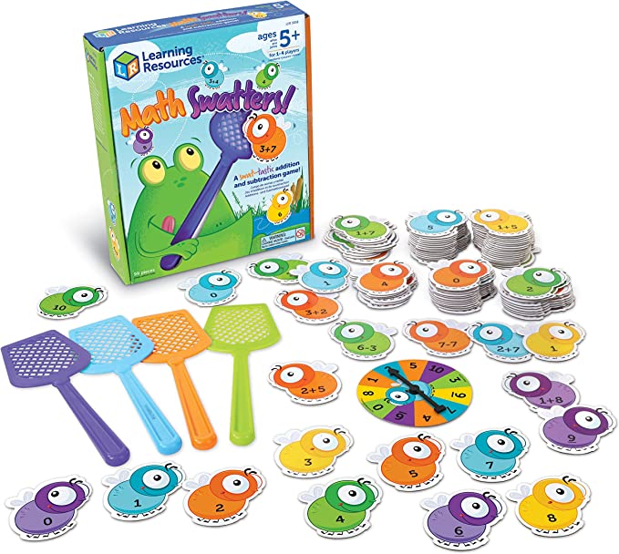 Educational math game with bug-shaped cards, a circular spinner, and four colorful plastic fly swatters.